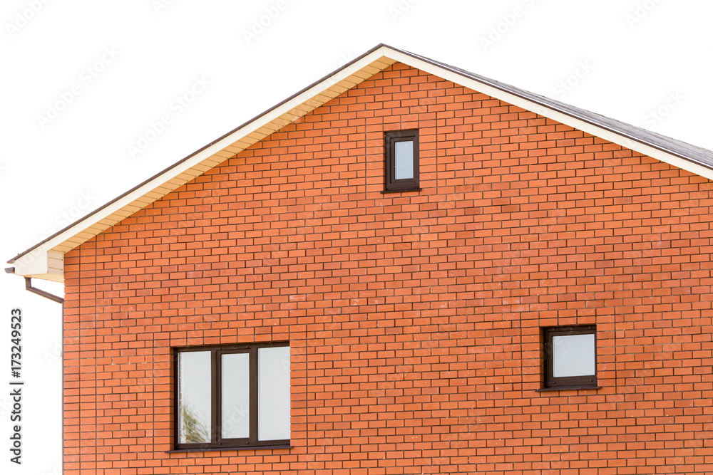 roof with a window in a brick house