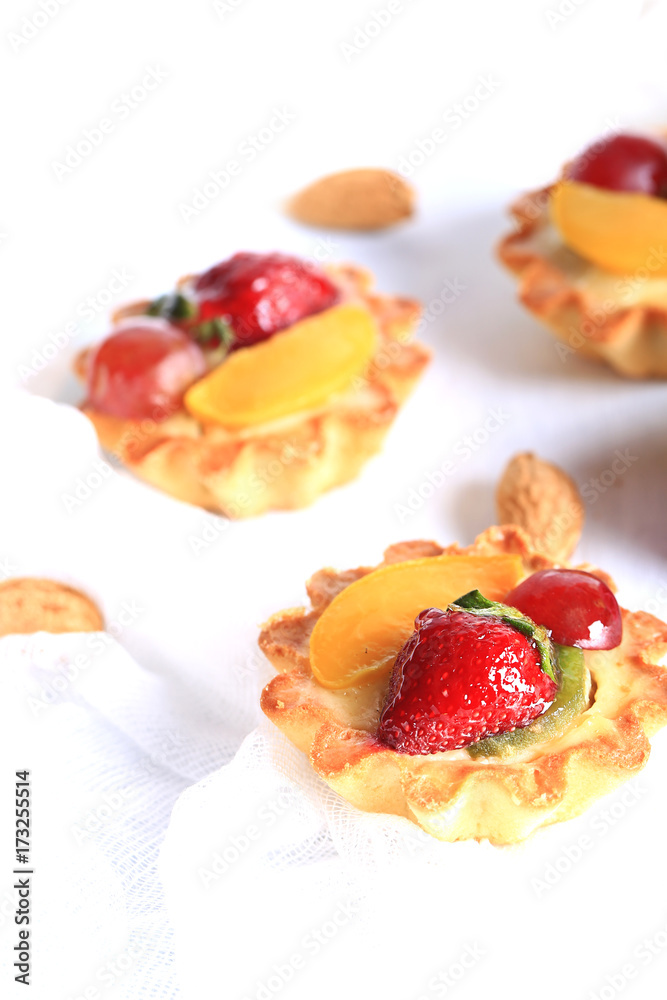 almond cake with strawberries on a white background selective soft focus almond cake with strawberries on a white background selective soft focus