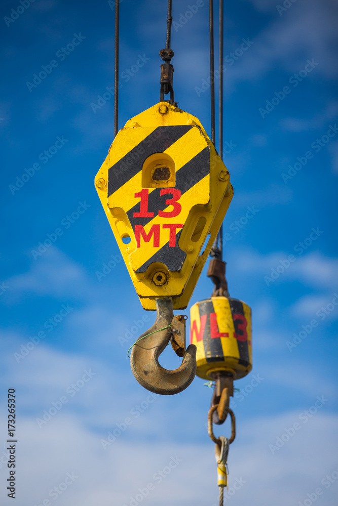 Crane hoist,wire rope sling and hook isolate on white background Crane hoist,wire rope sling and hook isolate on white background