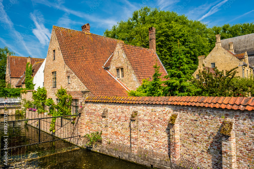 Bruges (Brugge) cityscape with water canal Bruges (Brugge) cityscape with water canal