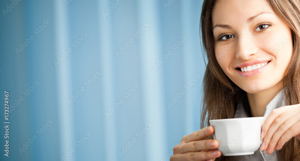 Cheerful smiling business woman with coffee Cheerful smiling business woman with coffee