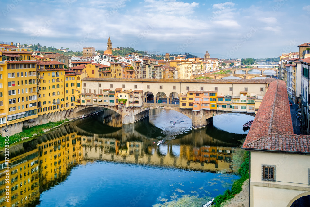 The city of Florence and the Ponte Vecchio, a medieval bridge over the river Arno