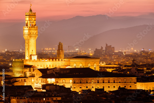 The Palazzo Vecchio and the historic centre of Florence illuminated at sunset