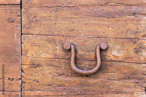 Italy: Close up of rustic old door