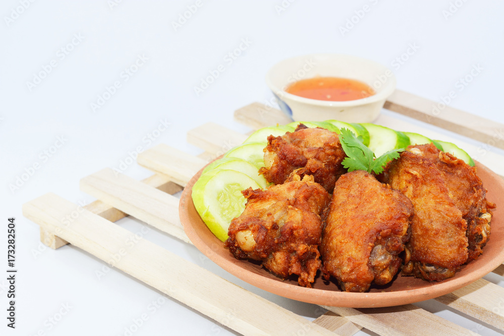 Fried chicken wings in batter with sauce Fried chicken wings in batter with sauce