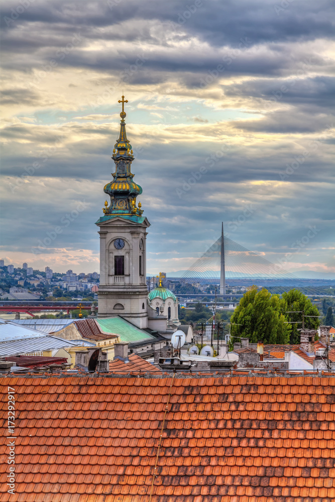 Tower of the Saborna Church, the dome of the Patrijarsija and the roofs of old Belgrade. HDR image.