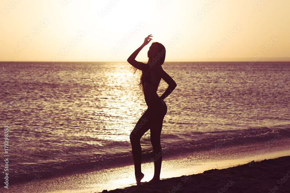 Fototapeta premium Woman is alone at beach