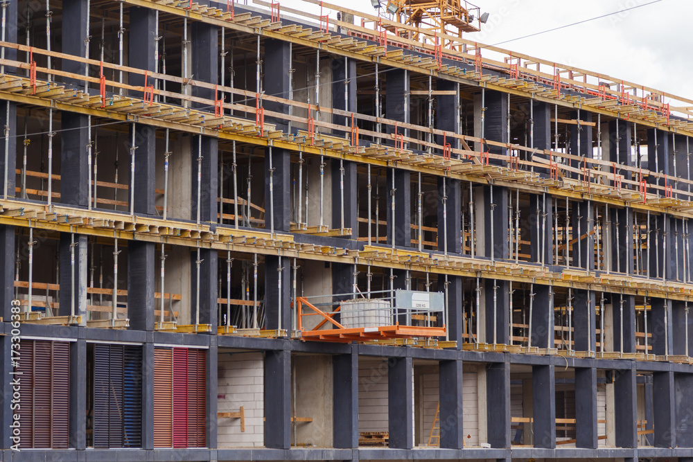 Monolithic building - Slip formwork. The construction of a precast concrete building in a monolithic way. Monolithic building - Slip formwork. The construction of a precast concrete building in a monolithic way.