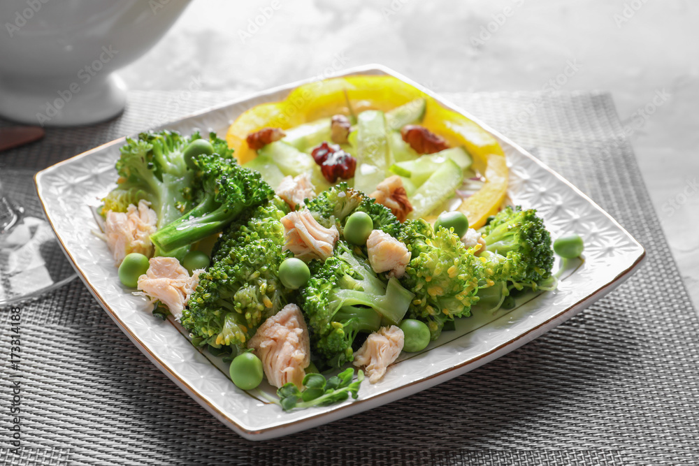 Plate with broccoli salad on table Plate with broccoli salad on table