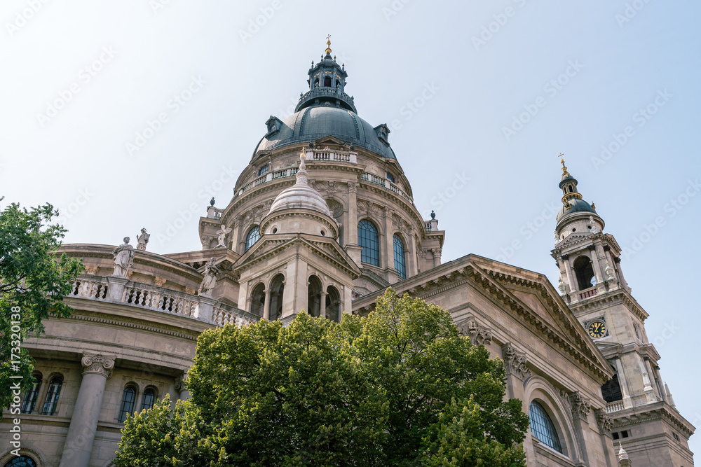 St. Stephen's Basilica, the largest church in Budapest, Hungary. Exterior in summer sun light with blue sky
