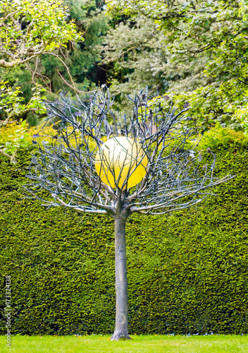 Garden tree statue in Cawdor Castle, Scotland photo