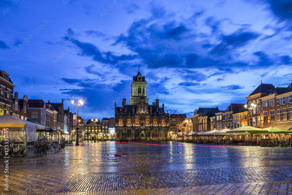 Travel Concepts and Ideas. Unique Stadhuis (Known as City Hall) at Local Markt Square (Market Place)  in Dutch Old City Delft during Blue Hour, in Holland, the Netherlands