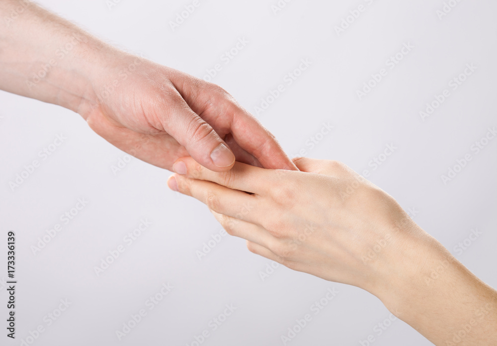  The hand of the man and the woman's hand