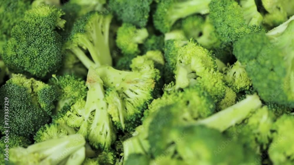 Slicing broccoli in commercial kitchen