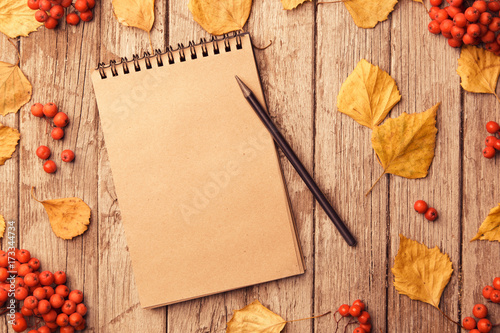 Craft Notebook with black pencil on wooden table, Education concept