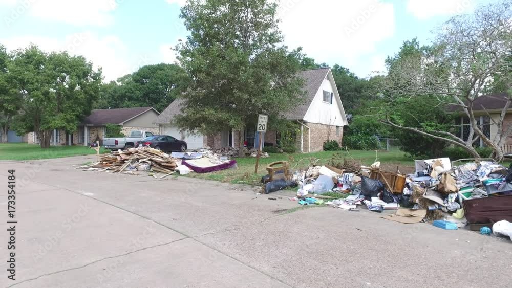 Devastated neighborhoods in Dickinson Texas. Trash and debris on the
