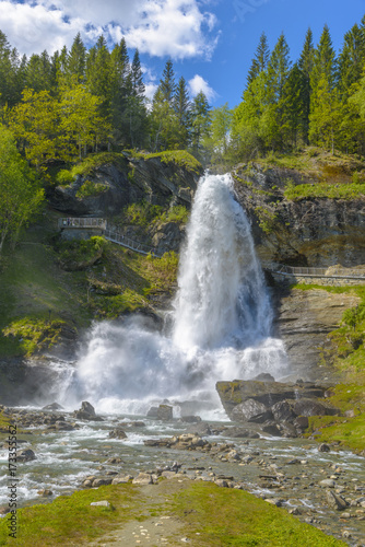 Splendid summer view with popular waterfall Steinsdalsfossen on the Fosselva River