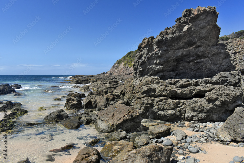 Beach with rock overhang