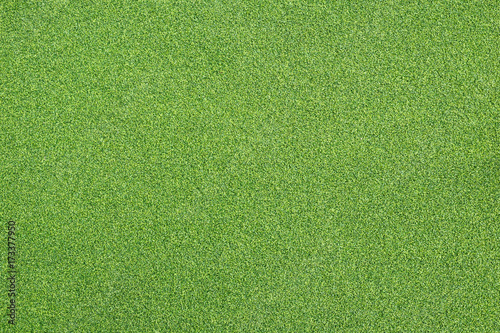 Bright green artificial grass can use for background and design. photo