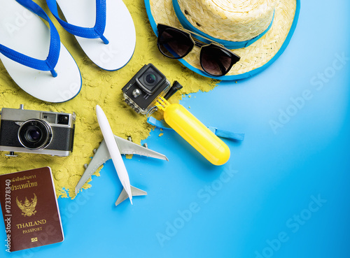 Summer travel fashion and object on blue copy space photo