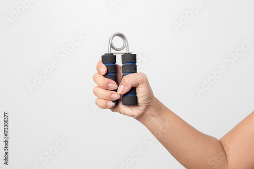 Photos Close-up woman hand exercise  using hand gripper
