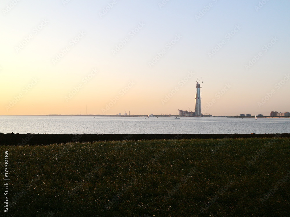 high-rise building on the shore