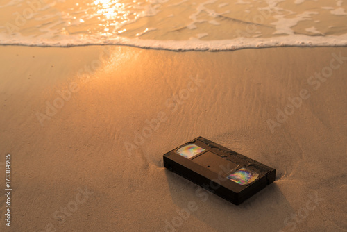 Old video tape on the beach in the morning