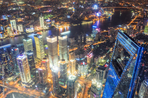 Aerial view of Lujiazui financial district at night in Shanghai,China © ABCDstock