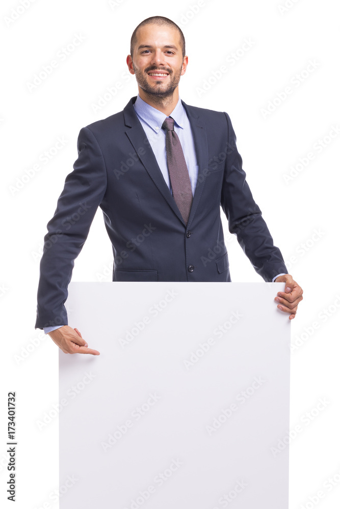Young business man holding a white banner on a white background Young business man holding a white banner on a white background