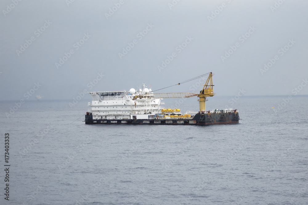 Offshore accommodation work barge to serve as an offshore accommodation to personnel and crew.