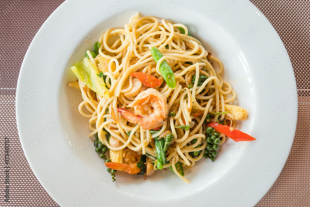 closeup Spaghetti with Shrimp on white plate . Italian food .