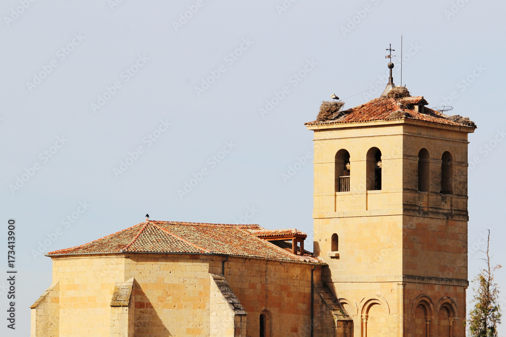 Storks' nests on the top of an old bell tower in Segovia, Spain 