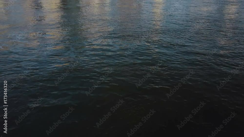 Aerial view of the Manhattan in New York, America. Drone flies low over East river to busy downtown of the famous city. Aerial view of the Manhattan in New York, America. Drone flies low over East river to busy downtown of the famous city.
