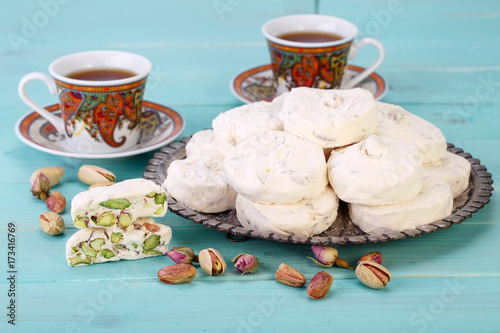 Konstfotografi Traditional Iranian and Persian pieces of white nougat dessert sweet candies (Ga
