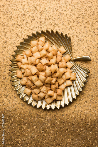 stock photo of  variety of Shakkar pare Also Know as Shakkarpare, Shakarpali, Shakkar Para, or Shankarpalli or shankar pale is a Snack Typically Made in India During Diwali
