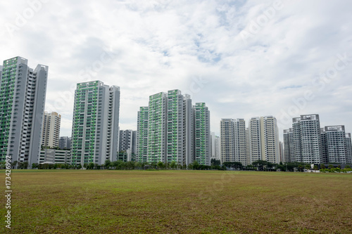 Skyline view of condominium, grasses and blue sky
