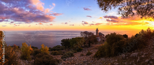 Fototapeta Naklejka Na Ścianę i Meble -  Lighthouse Gelidonya Feneri on sunset. Panoramic view ( Kemer, Turkey). Lovely place of tourists. Lycian way. Walking tour