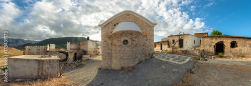 Sfentyli is an abandoned village which is sinking every winter when the dam of Aposelemi gets filled with water.   photo