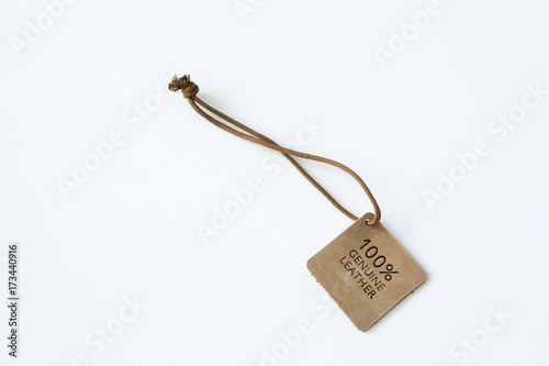 Genuine brown leather label on white background