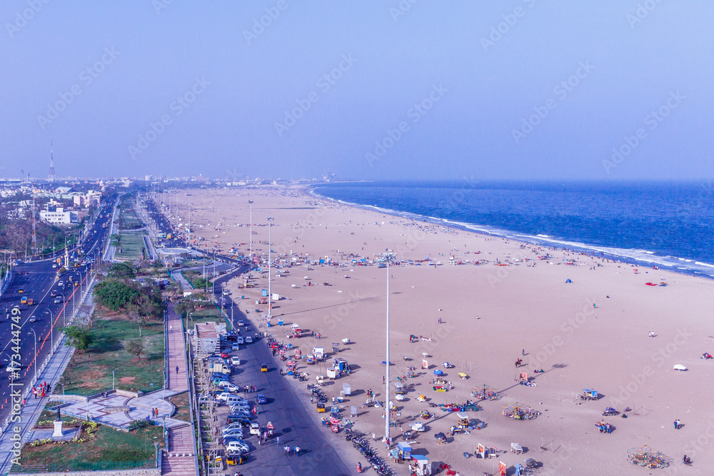 Birds eye view from light house and the shadow of light house, Marina Beach, Chennai. Its longest natural urban beach in India and one of the world's longest beach ranking.