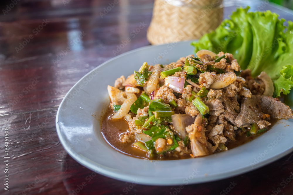 Spicy minced pork salad (Laab) at Thai street food