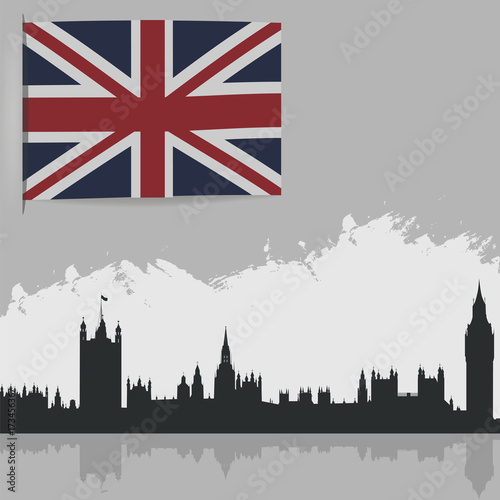 Flag of Great Britain and the outlines of buildings.