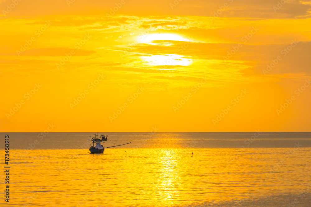 The golden sun in the morning of a new day on the sea in the Gulf of Thailand
