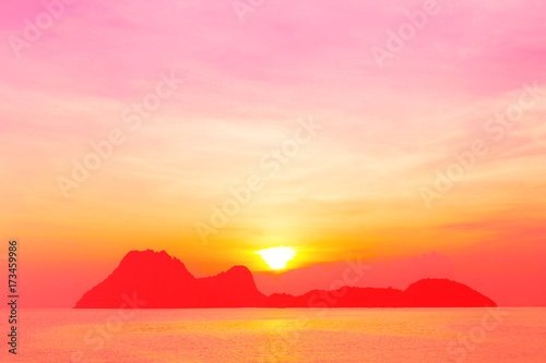 Bright colors at dawn on the beach at sunrise in the Gulf of Thailand.