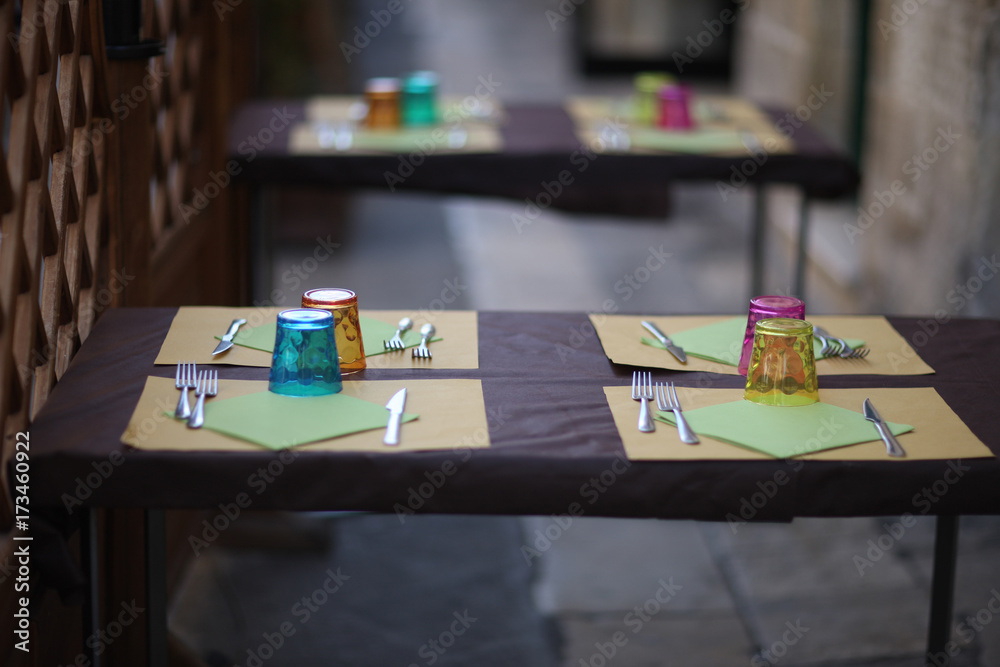 Fototapeta premium Cafe table served with appliances before the arrival of visitors