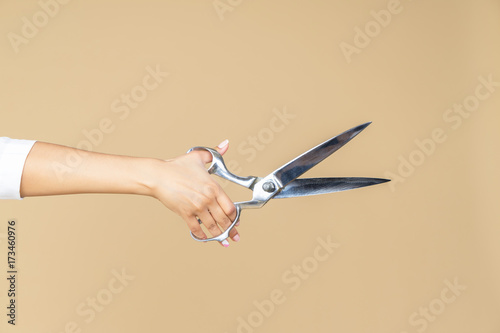Hand with scissors