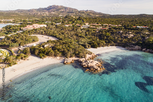 spettacolare vista aerea della spiaggia di Capriccioli in costa Smeralda in Sardegna. Mare sole e tanto verde, il paradiso terrestre. photo