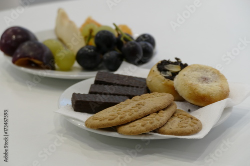 sweet unhealthy snack for a party made of cakes photo