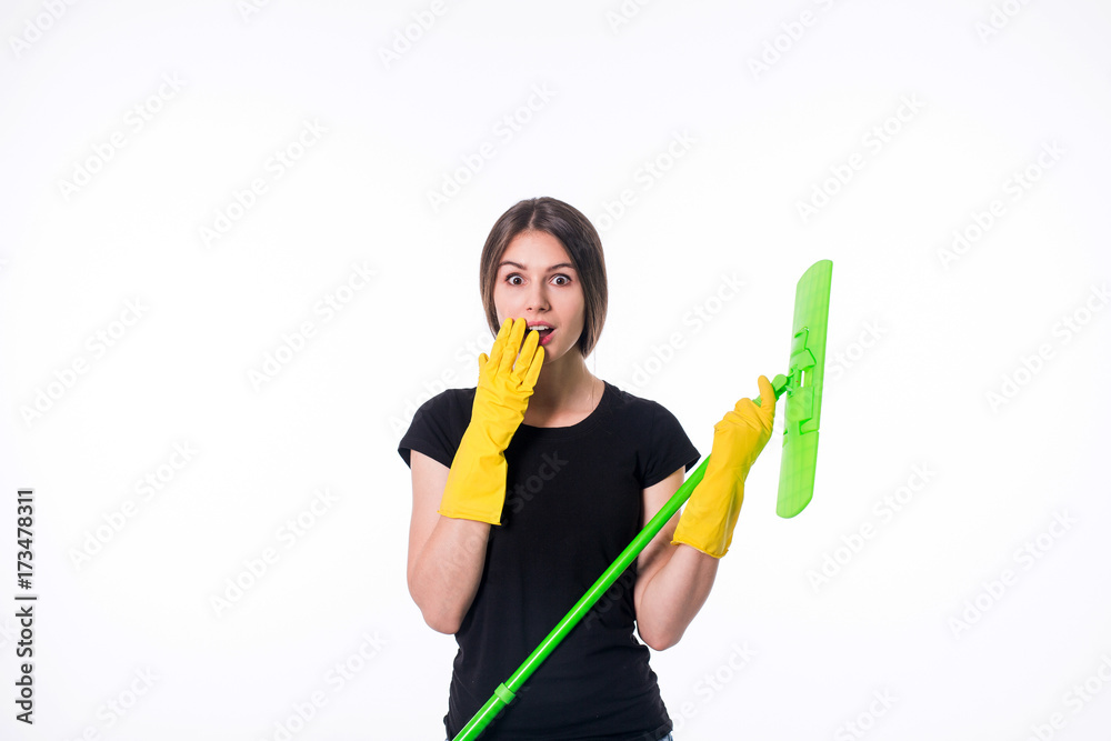 Cleaning girl happy excited during cleaning. Funny girl with cleaning mop isolated on white background Cleaning girl happy excited during cleaning. Funny girl with cleaning mop isolated on white background