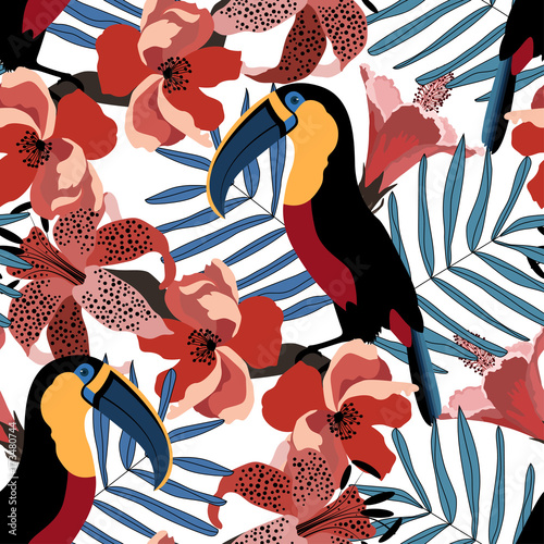 Tropical seamless pattern with cute toucans,flowers and leafs.Colorful vector summer background.Textile texture